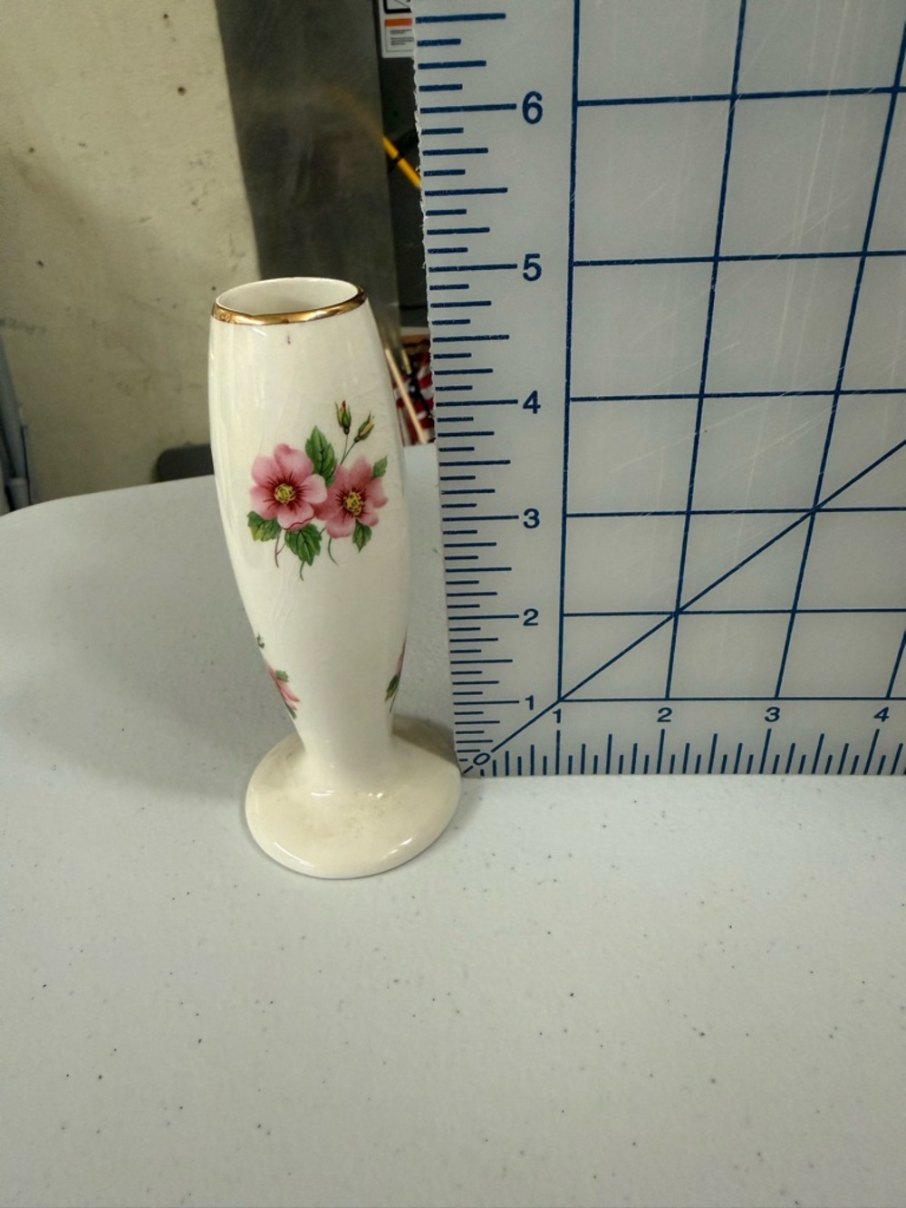 Delicate White Porcelain Bud Vase with Pink Floral Motif and Gold Rim - Picture 2 of 4